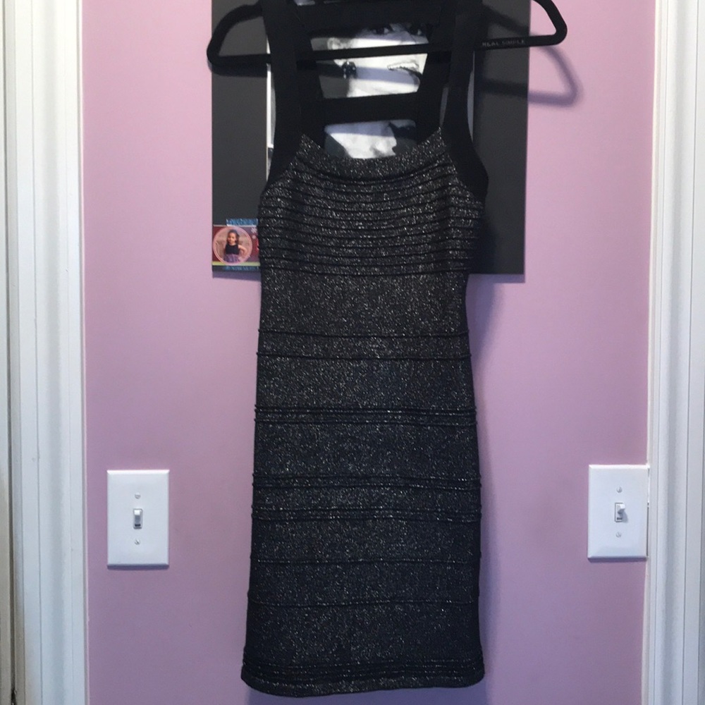 Sparkling mini dress with awesome back cut outs
